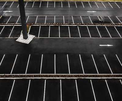asphalt sealer in a parking lot