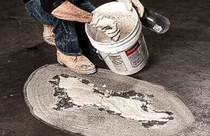 filling damaged concrete with epoxy patch