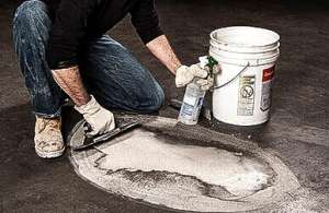 smoothing damaged concrete with epoxy patch