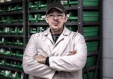tri-chem chemist in lab